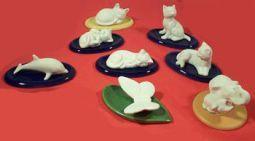 Volatile Poes slapend met onderlegger