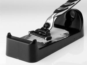 Scheermesjesreiniger zwart