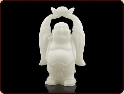 ONBEKEND \ MERKLOOS Sneeuwkwarts boeddhabeeld met schaal boven hoofd